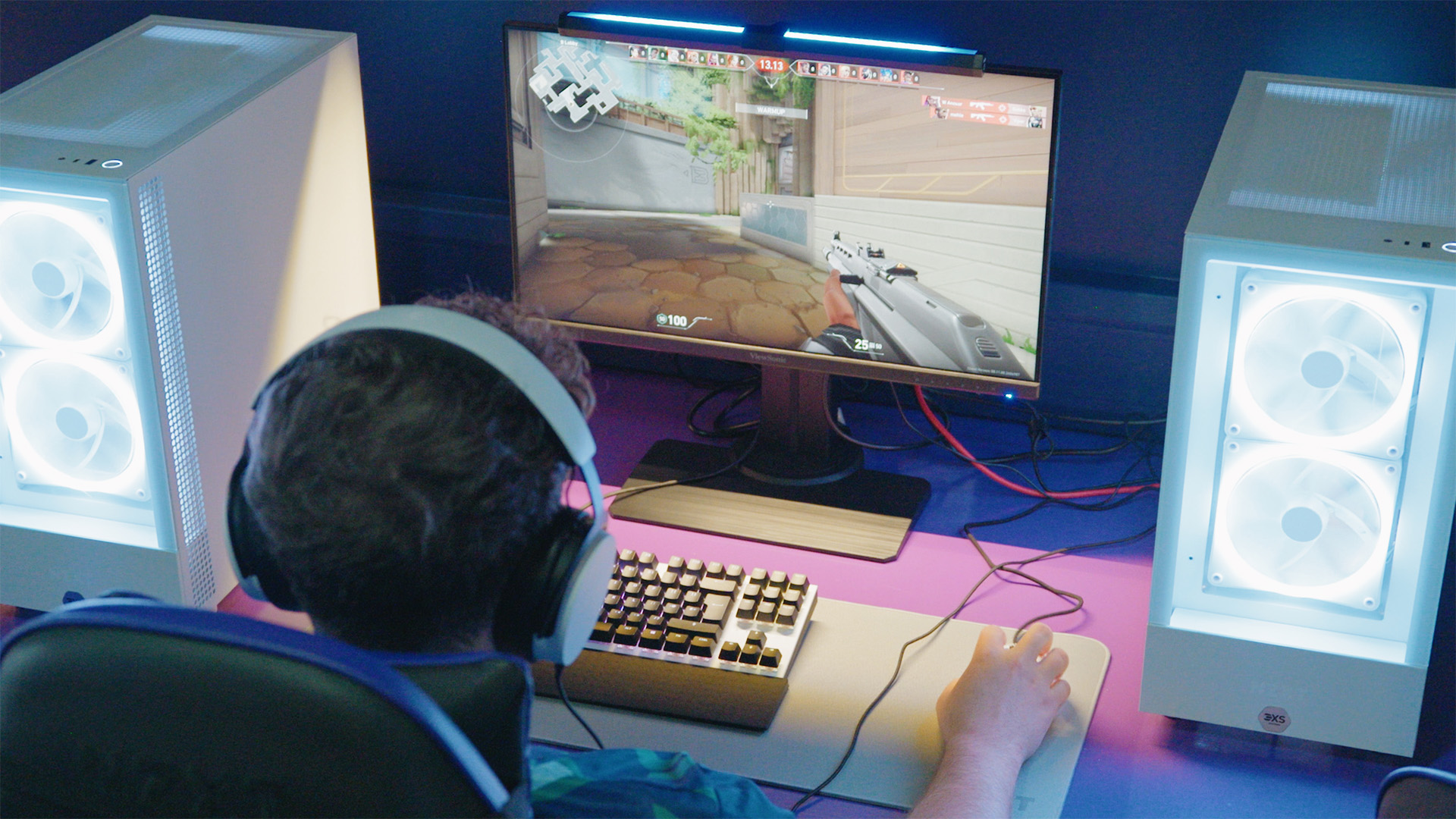 A Jesus College student gaming on a ViewSonic GAMING monitor