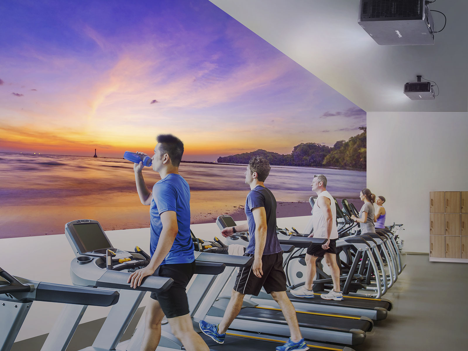 Fitness training with a projector display in a gym.