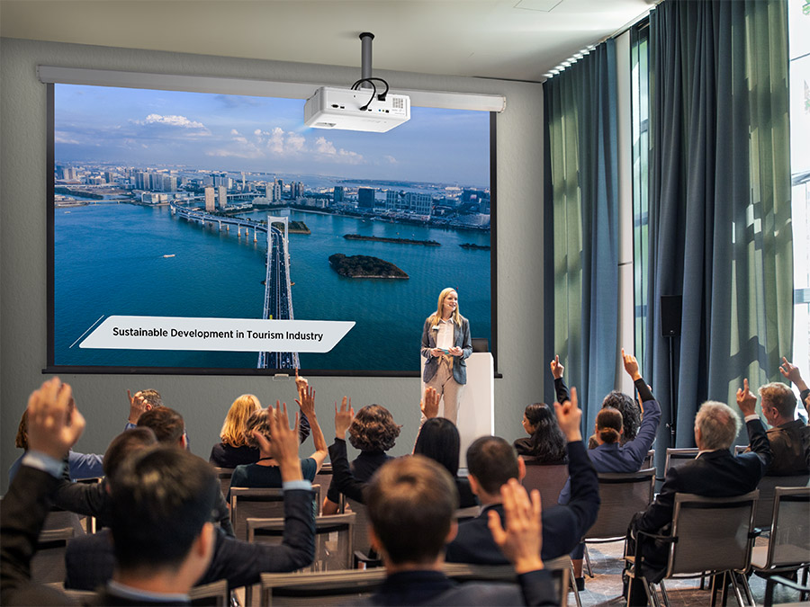 High-brightness projector displaying clear visuals in a meeting room.